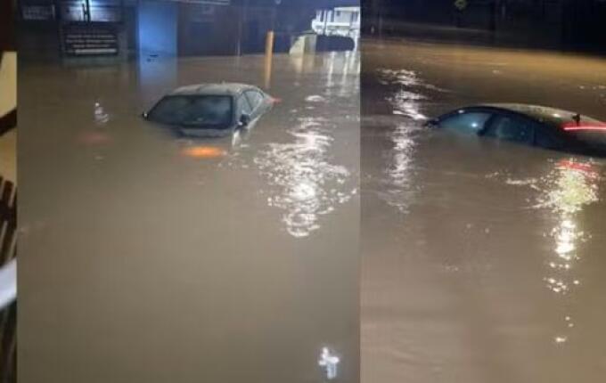 Chuva forte alaga ruas, arrasta carro e deixa moradores ilhados em Palhoça